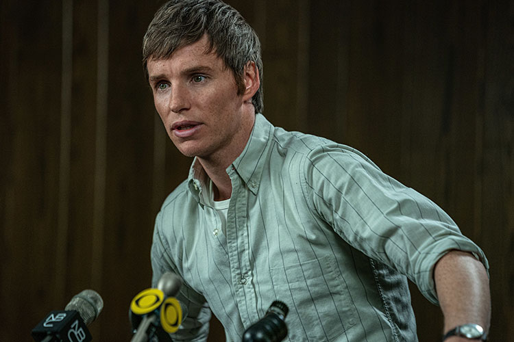 Eddie Redmayne as defendant Tom Hayden